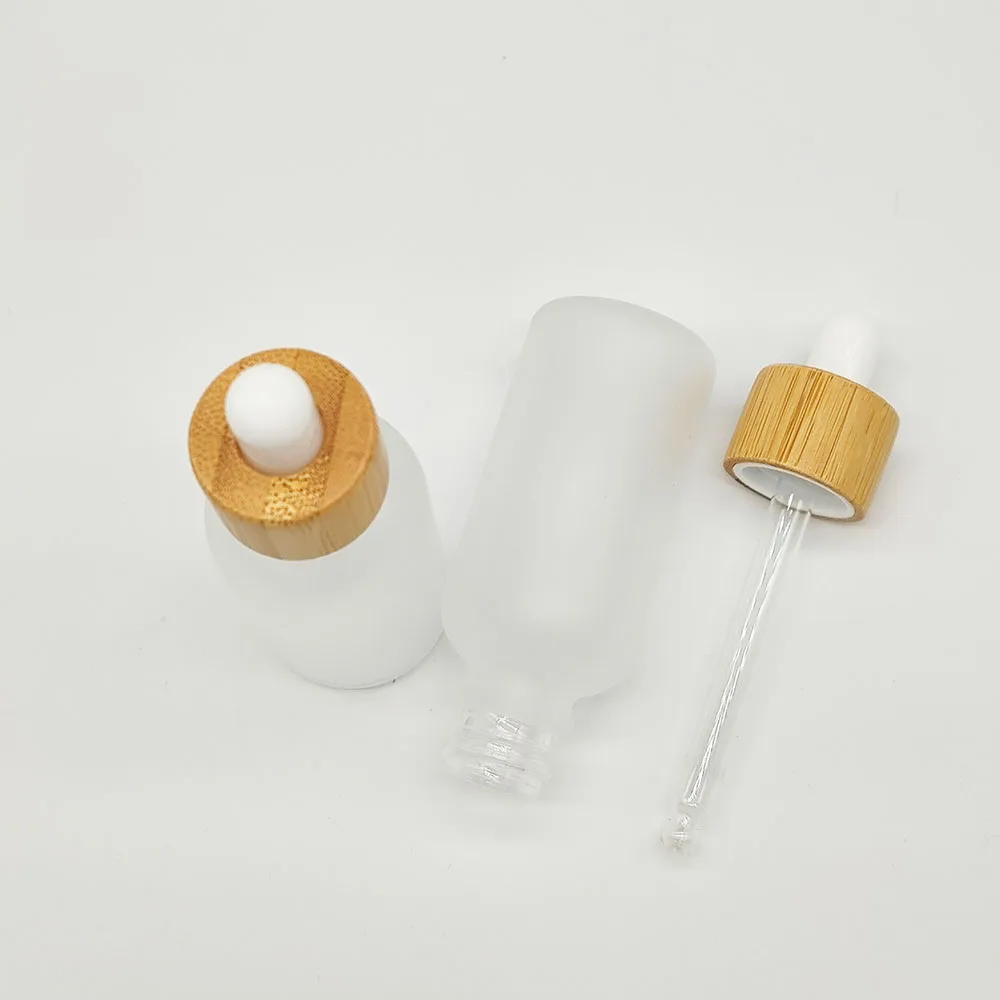 24 عبوة من زجاجات قطارة زجاجية سعة 30 مل مع غطاء من الخيزران زجاجة زيت عطري فارغة حاويات مستحضرات التجميل قوارير جرة زجاجية