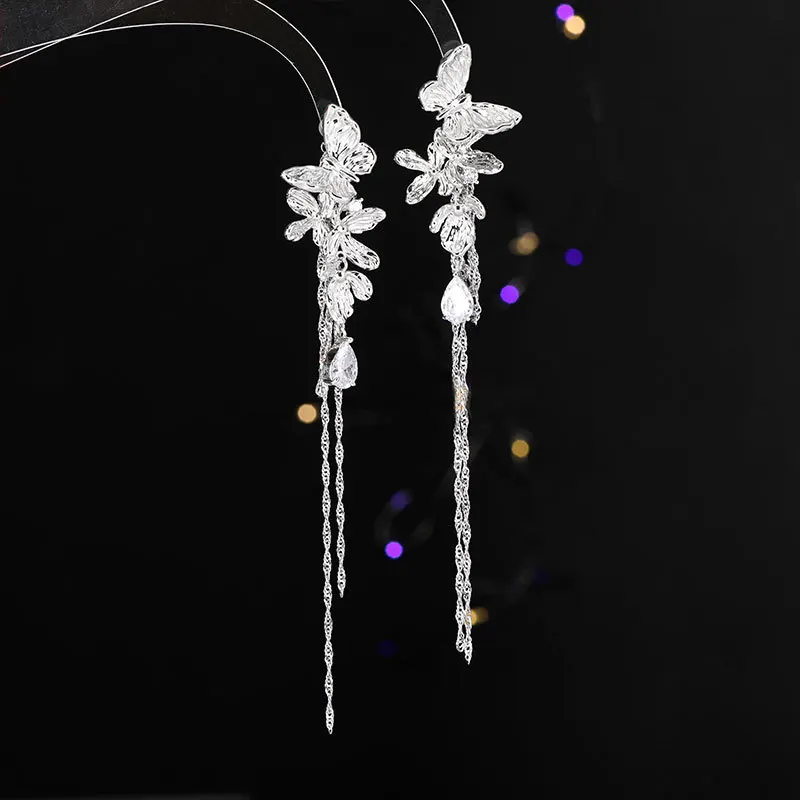 Pendientes largos de lujo para mujer, aretes de borla de flor de mariposa, aguja de plata, circón, viento frío