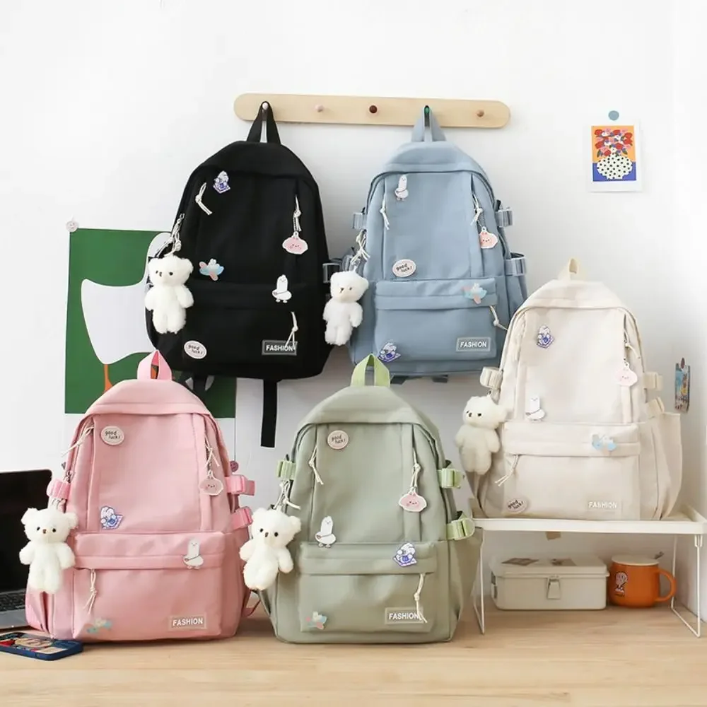 Zaino in tinta unita con ciondolo orso Kawaii Distintivo Borsa da scuola per studenti in stile coreano Borsa da viaggio Borsa a tracolla Borsa da esterno