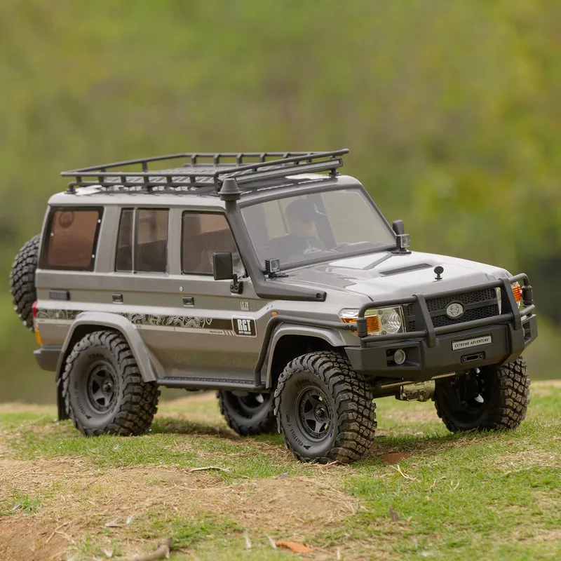 

Радиоуправляемый внедорожник RGT Rescuer EX86190 в масштабе 1/10, модель LC76, электрический, для любителей хобби, для сложного бездорожья и скалолазания.