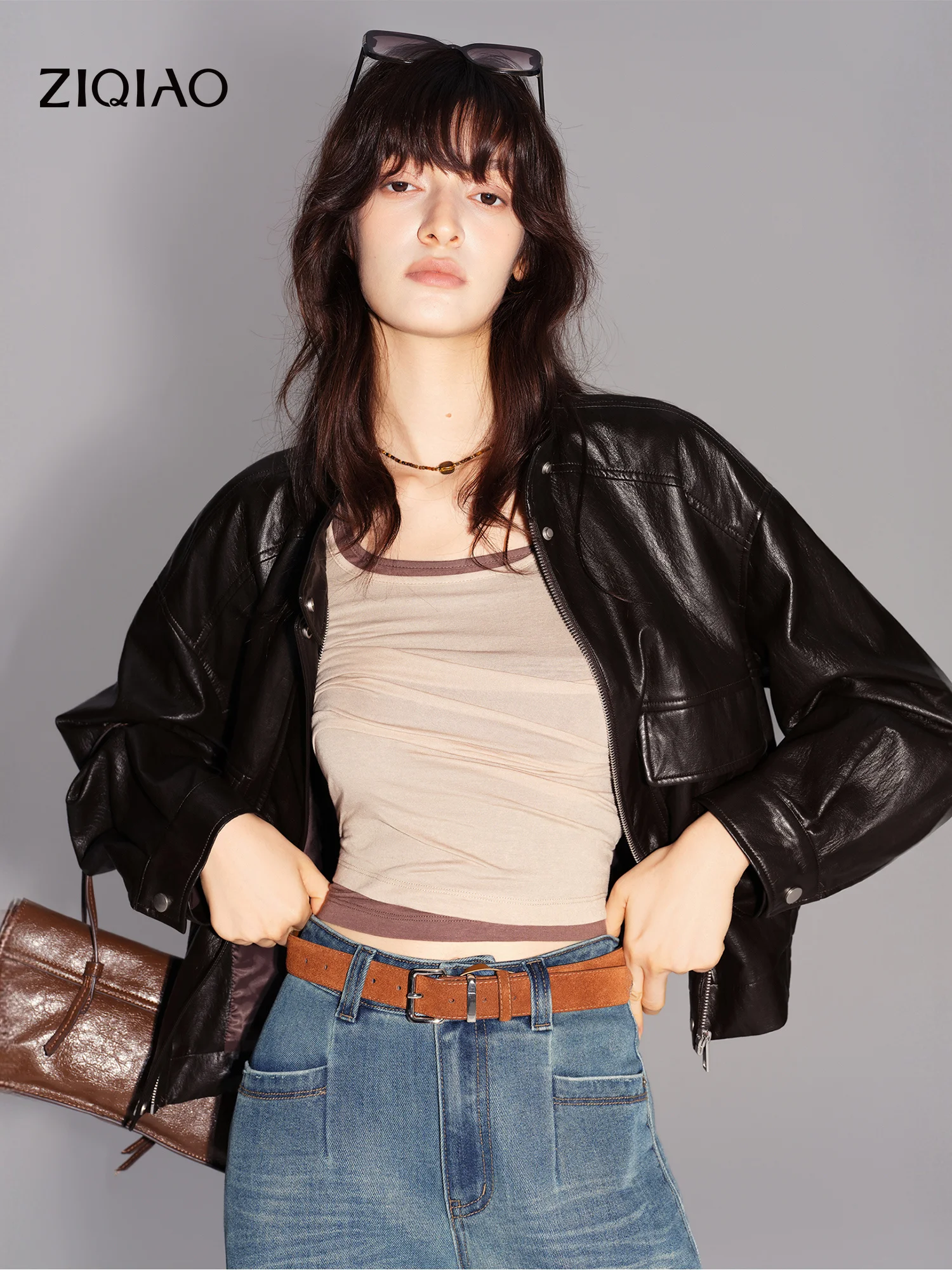 ZIQIAO Women's 2026 Fall New Textured Faux PU Leather Jacket Dropped Shoulders Stand Collar Design Short Coat with Large Pockets