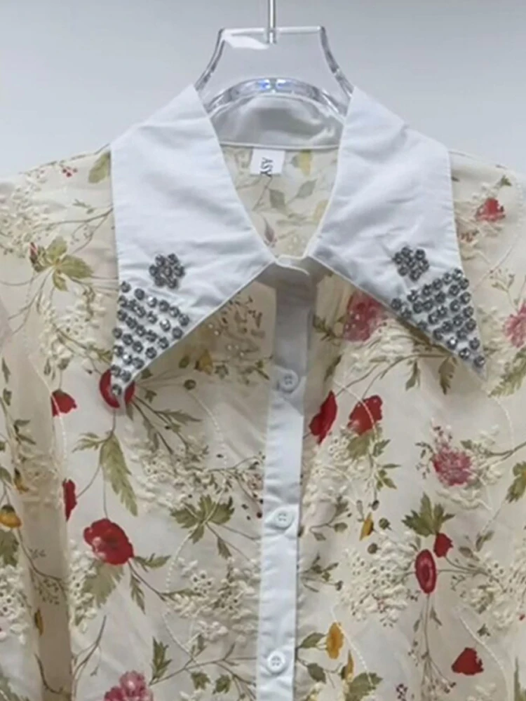 

Design sense niche 2025 summer new product women's hollow embroidery printed lapel collar irregular short sleeved shirt