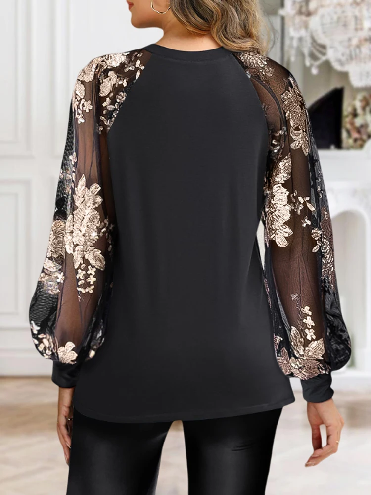 

Блузка с прозрачными сетчатыми рукавами-фонариками и круглым вырезом с пайетками и цветочным принтом