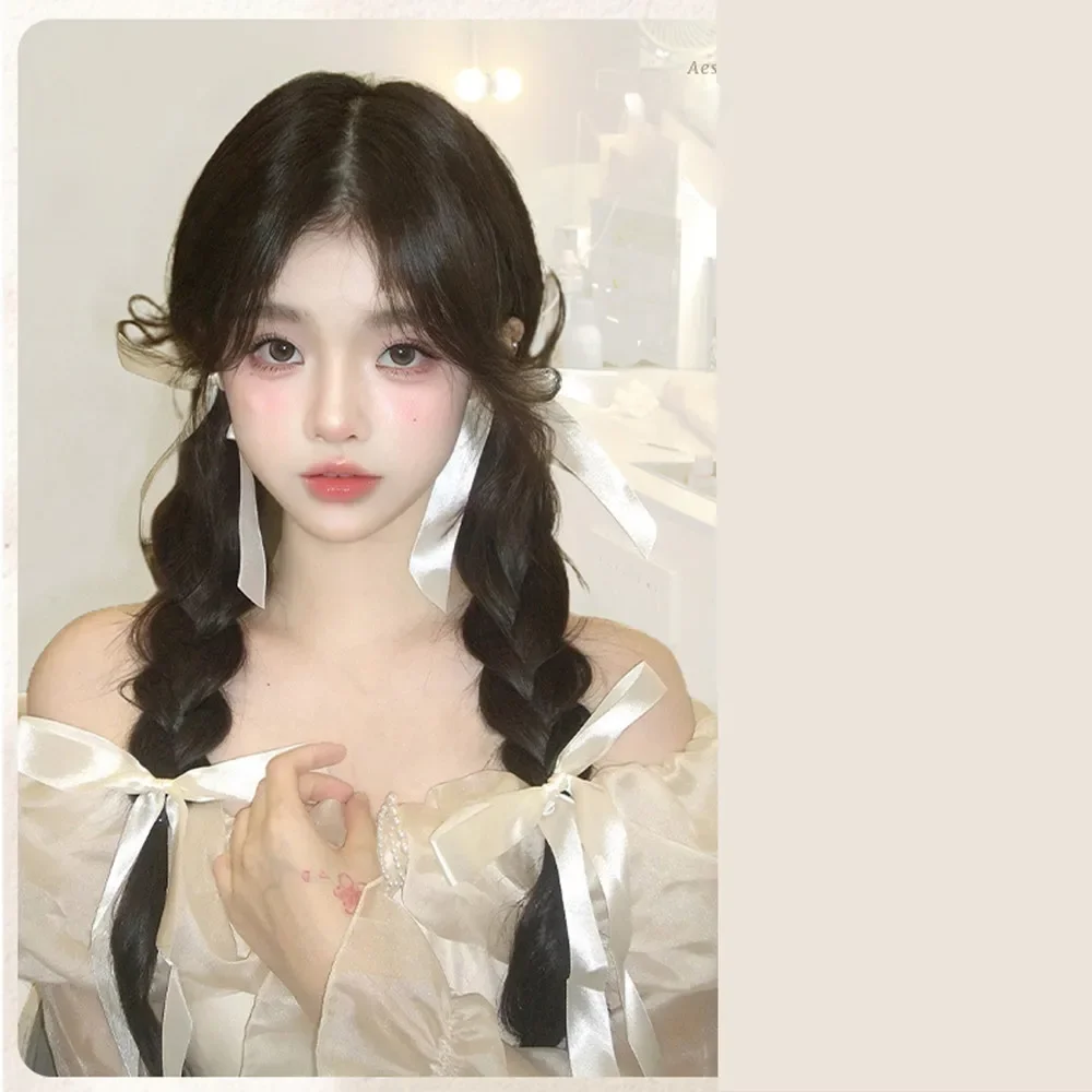 Il fiocco naturale simula la doppia parrucca sintetica a coda di cavallo con le estensioni dei capelli con trecce a nastro