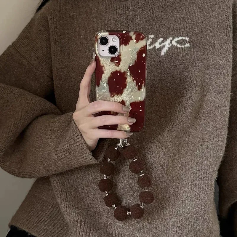 

White splashed ink, red brown and yellow brown color block phone case with Plush ball chain for iPhone 11 12 13 14 15 16 pro max