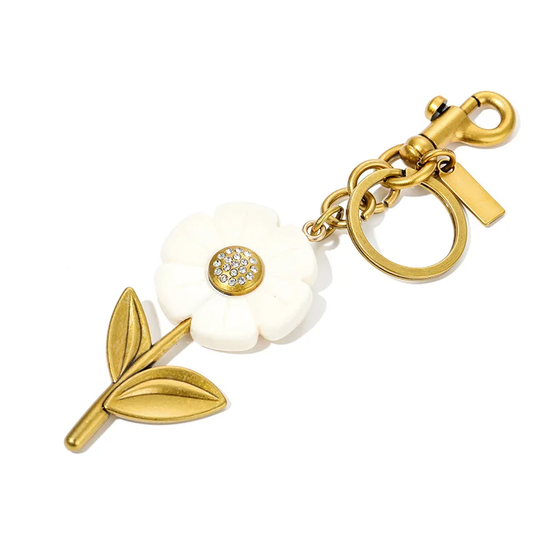 

Аксессуары для сумок: брелок-украшение из старинного сплава в виде цветка