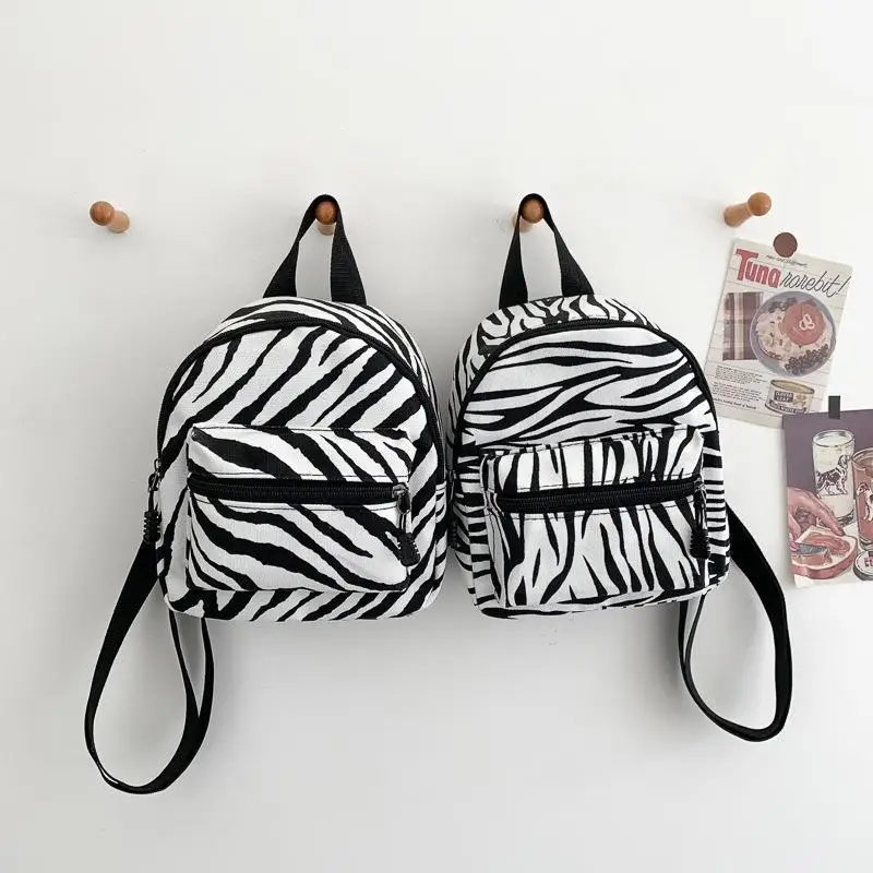 Mini mochila de nailon para mujer, bolso pequeño con estampado Animal, mochilas escolares para niñas adolescentes, novedad