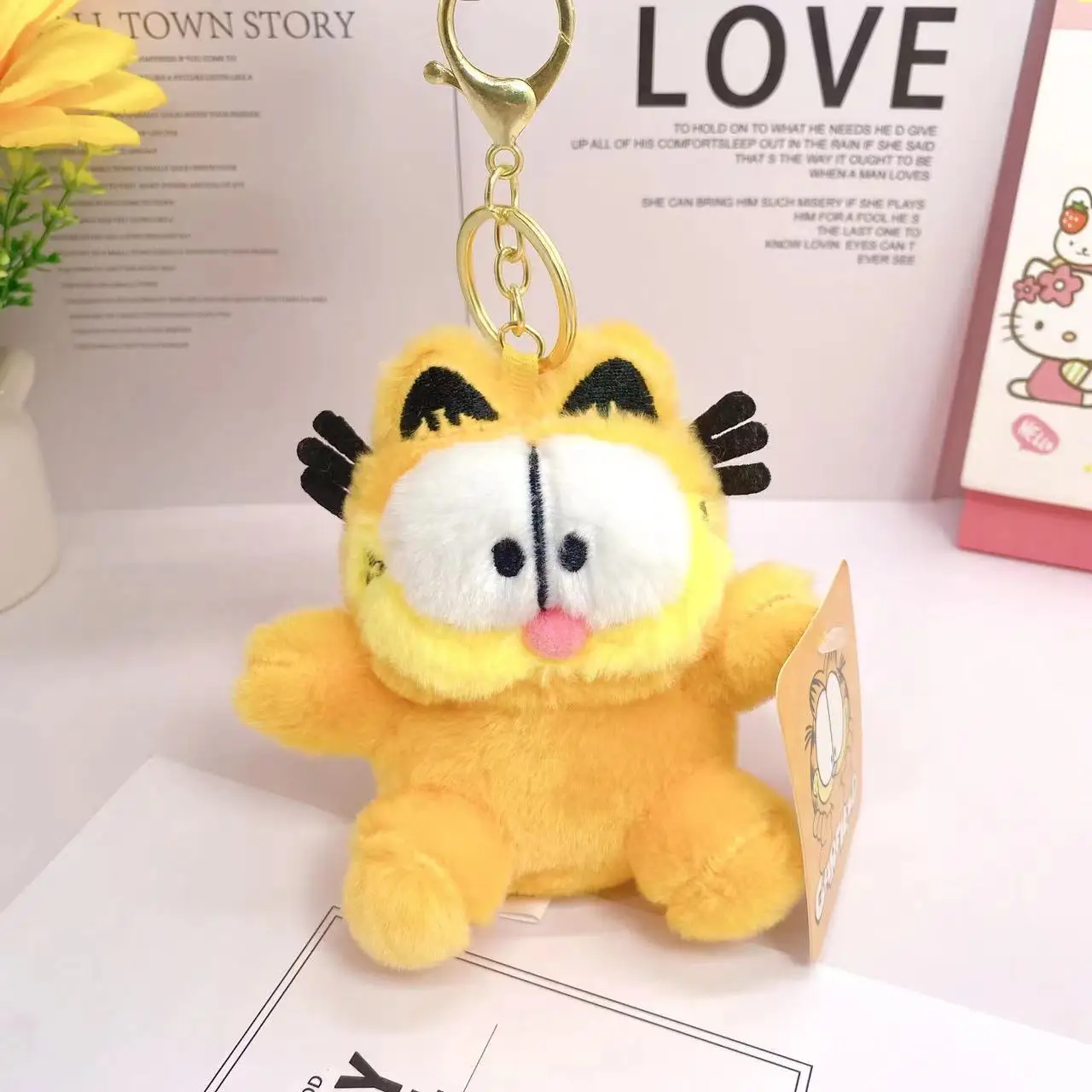 การ์ตูนคลาสสิกอะนิเมะการ์ฟิลด์ตุ๊กตาพวงกุญแจน่ารักกระเป๋าเป้สะพายหลังจี้ตกแต่งสร้างสรรค์ตุ๊กตาขนาดเล็กเด็กวันหยุดของขวัญ