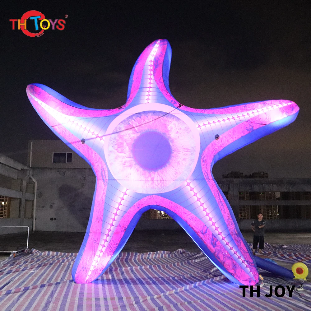 Incredibile grande gonfiabile stella marina mostro palloncino a forma di stella modello di animale marino con un occhio per la costruzione di decorazioni murali