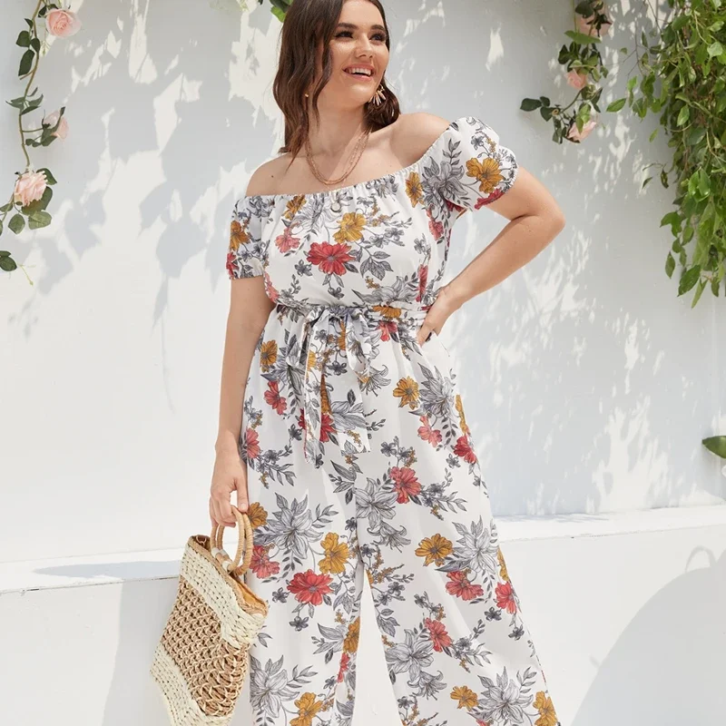 Plus Size Floral Print Eleganckie letnie kombinezony damskie z ukośnym dekoltem i krótkim rękawem z szerokimi nogawkami Casual Boho Jumpsuits Duży