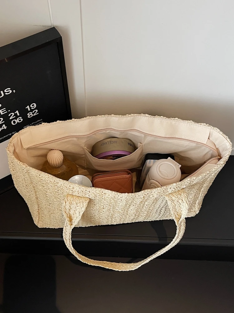 Spring 2026 Large Capacity Hollow out Woven Tote Bag Women's Commuter Beach Vacation Shoulder Bag Zipper Closure Straw Handbag