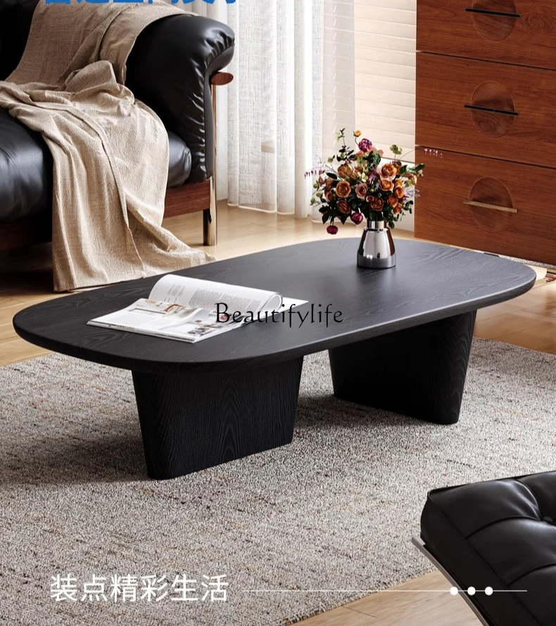 

Medieval black Italian oval coffee table small apartment light luxury high-end solid wood