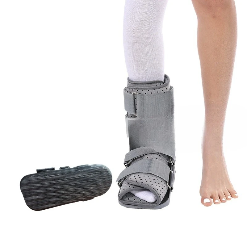 Recovery footwear for torn Achilles tendon orthopedic care. Stabilized walking brace boot for Achilles tendon fixation support