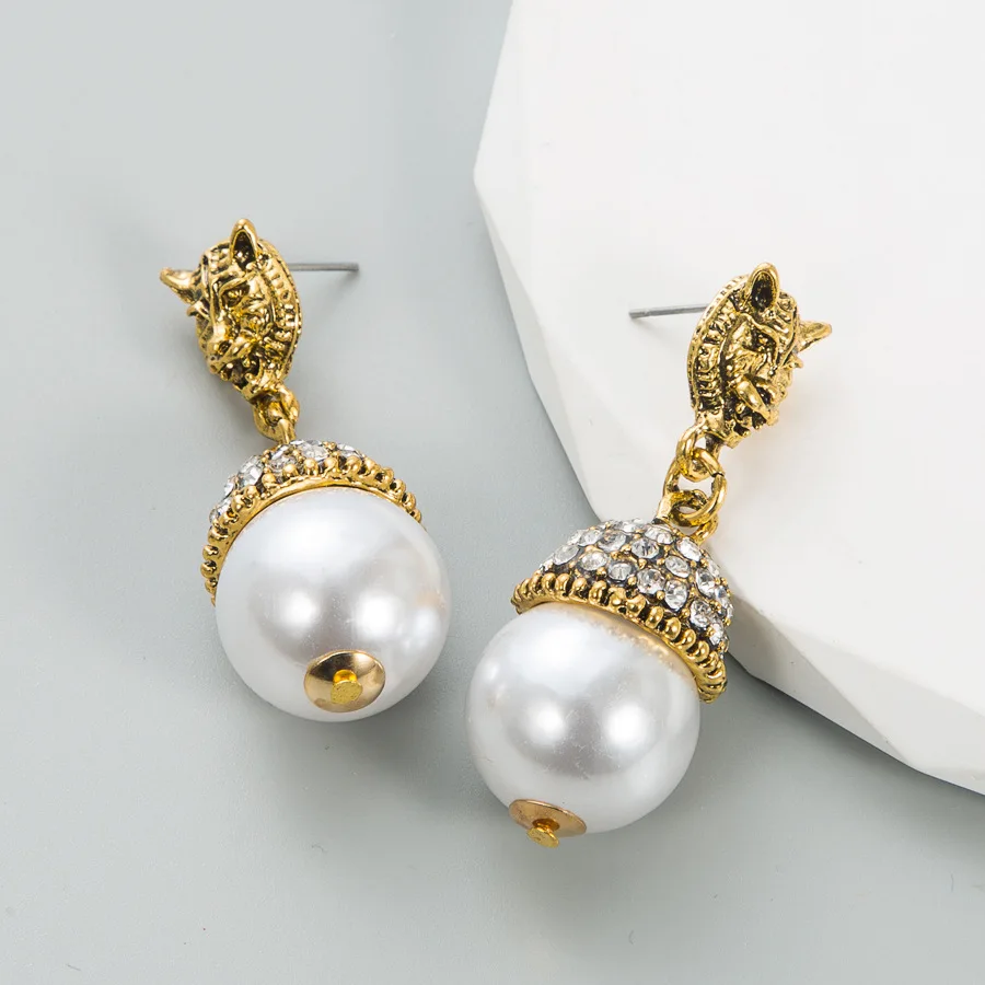 Fashion personality rhinestone pearl stud earrings women's foreign trade explosion retro high-end temperament animal tiger head