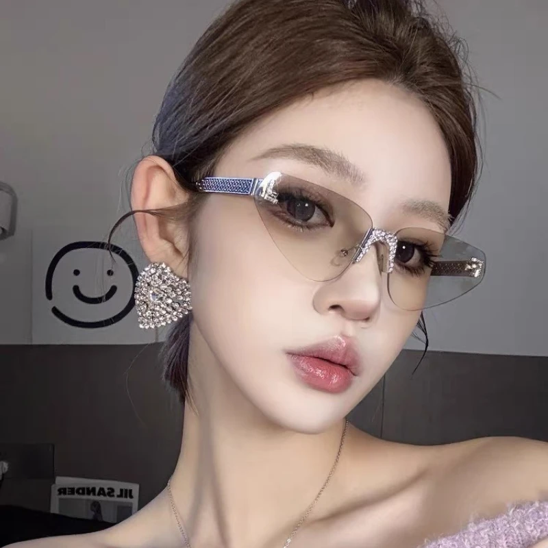 女性のセクシーなキャットアイリムレスラインストーンサングラス高級ブランドデザイナーレトロパンクメタル UV400 ドライビンググラス