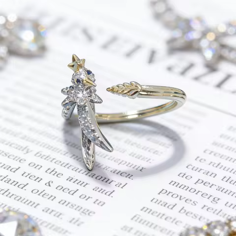 A vintage-style, luxurious bird-shaped open ring in 925 sterling silver, set with cubic zirconia; a unique holiday ring.
