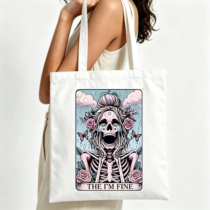 skull and floral graphic canvas tote bag with artistic print, ideal for casual daily use and weekend outings
