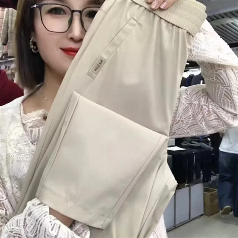 جديد 2025 السراويل النسائية الكورية الصيف واقية من الشمس رقيقة عالية الخصر عادية فضفاض تنفس السراويل الرياضية الإناث هارون السراويل السيدات