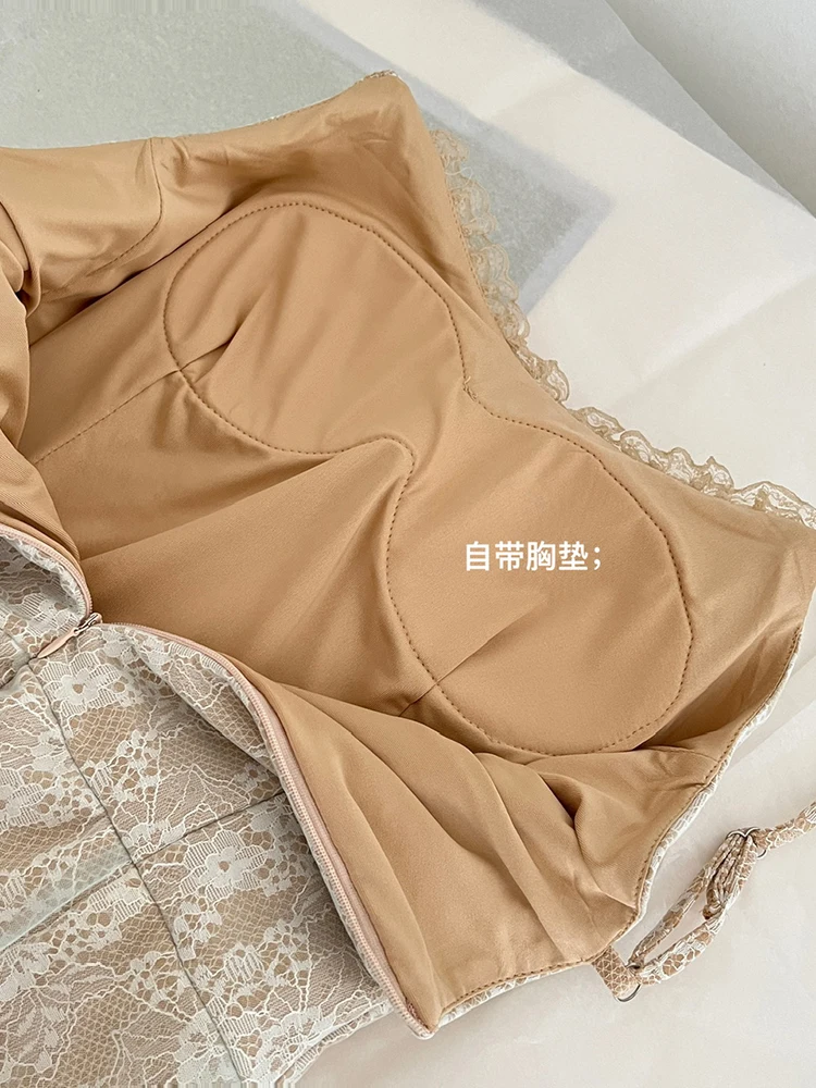 فستان دانتيل بحزام سباغيتي على الموضة الكورية للنساء لصيف 2025 بدون أكمام فستان طويل شبكي أنيق للحفلات والنوادي مع وسادة صدر