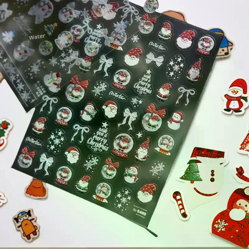 Seasonal Nail Decor with White Snowman and Crystal Snowball Motifs