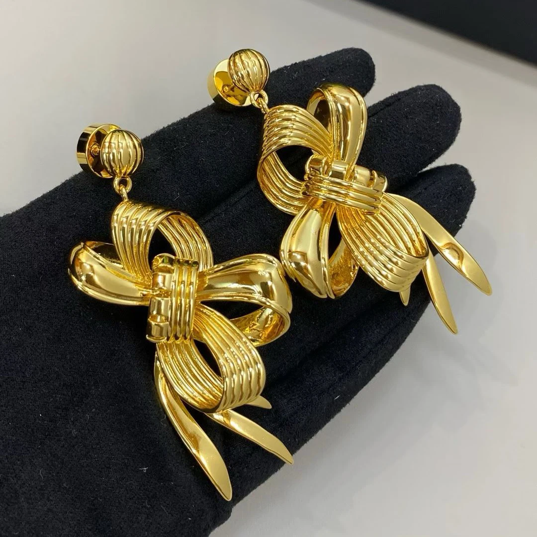 

Новая мода в Европе, высокое качество, латунные позолоченные серьги-подвески с бантом, женские серьги Lovey Boutique, подарок, тренд ювелирных изделий