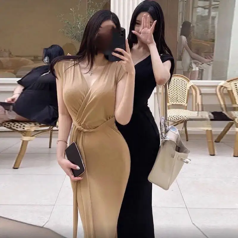 Corea sexy vita-serraggio cravatta spalla imbottita profondo scollo a V elegante abito lungo senza maniche moda donna sexy top UTW2