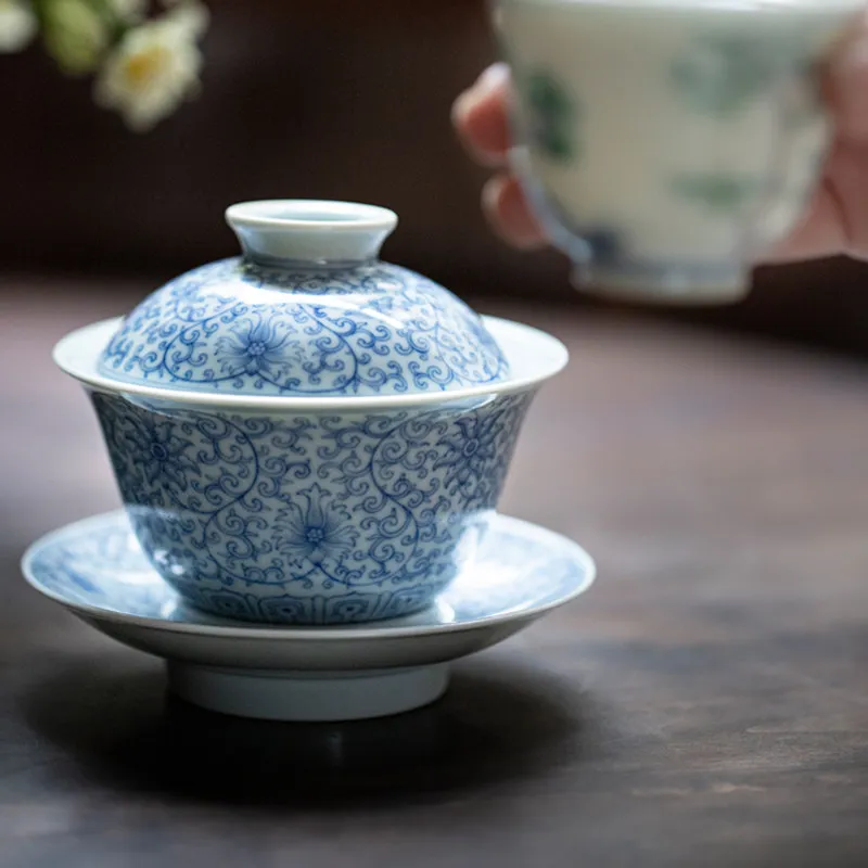 Blue and white light drawing tea bowl hand-painted hand-made tea cover bowl Sancai bowl 140ml
