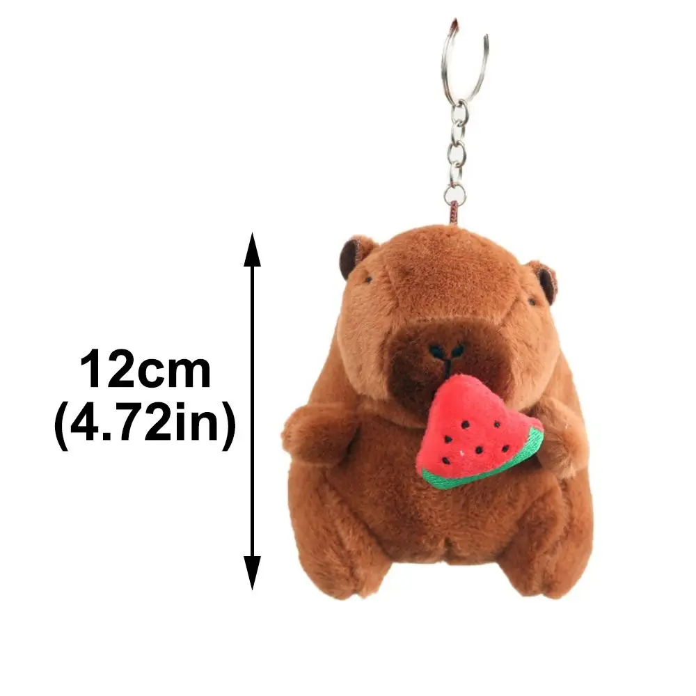 LLavero de capibara de peluche Kawaii, colgante de capibara de simulación de dibujos animados de 12cm, colgante de bolso escolar para tirar de mocos