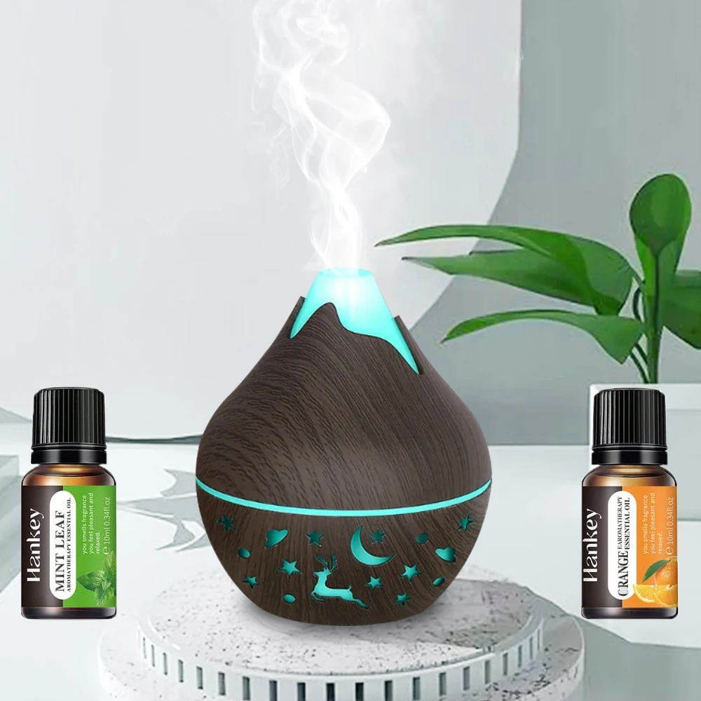 

200ML USB Air Humidifier Aroma Diffuser Mist Wood Grain Oil Diffuser forOffice Home have 7 LED Light contains two bottles of ess