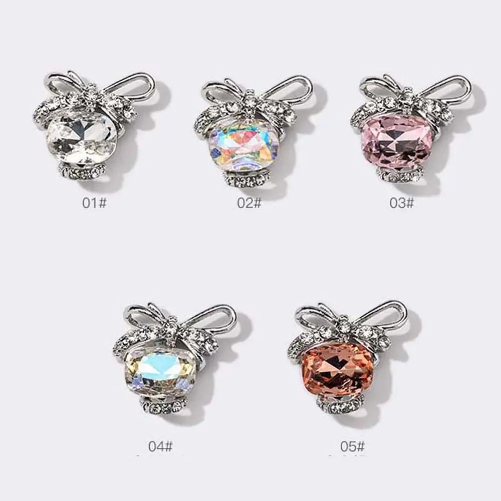 4 ชิ้น/เซ็ตโลหะเจาะเล็บโบว์ตกแต่งเล็บเล็บเครื่องประดับเครื่องประดับเล็บคริสตัลเล็บอุปกรณ์เสริม
