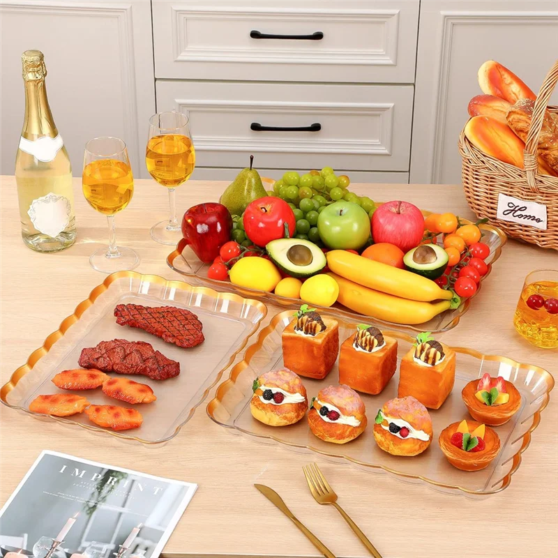 

AT19-Clear Plastic Rectangular Wave Serving Trays In 3 Sizes-14" X 10", 16" X 11", 18" X 12.5", Featuring Gold Trim Platter