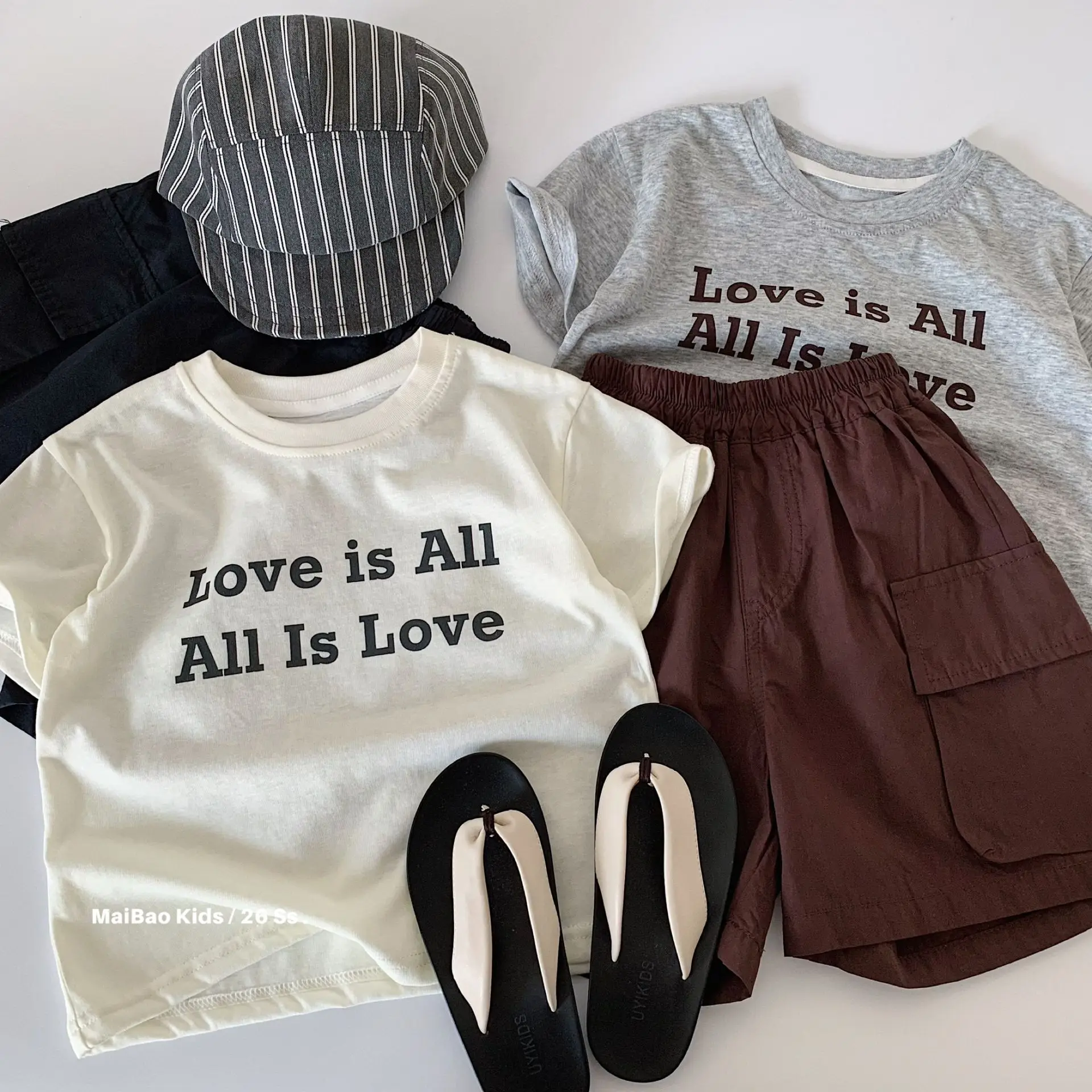 Children's Clothing Set 2026 New Summer Collection Letter Short Sleeve Top Solid Color Work Pants Two Piece Set