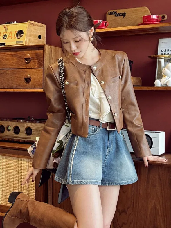 เสื้อโค้ทหนัง PU สไตล์เรโทรเกาหลีทรงหลวมสำหรับผู้หญิง แฟชั่นฤดูใบไม้ร่วง