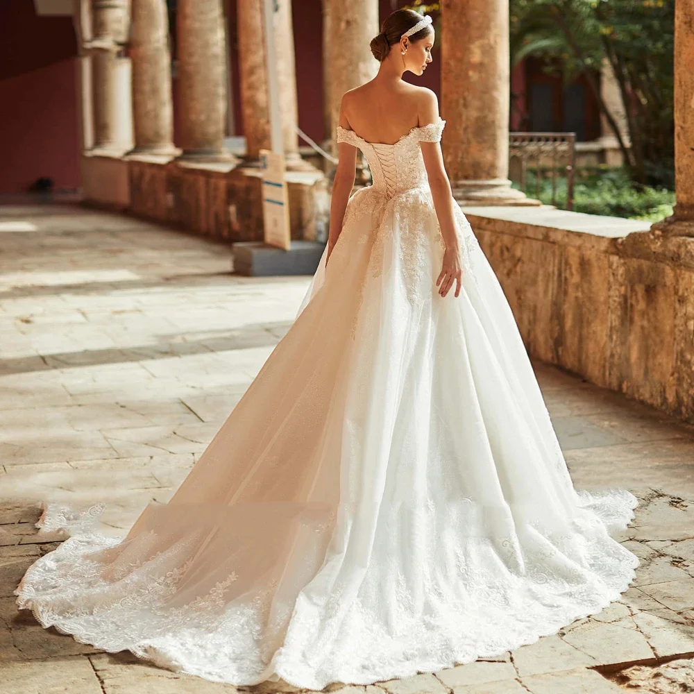 魅力的なプリンセス ウェディングドレス 刺繍レース ボールガウン ボートネック ノースリーブ ​ ブライダル レースアップ Vestido De Novia カスタマイズ