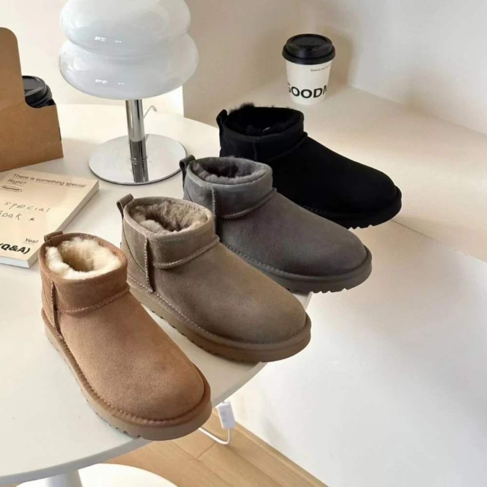 

Snow boots, sheep fur integrated short tube mini, thick soled sponge cake mini, short and thick cotton boots