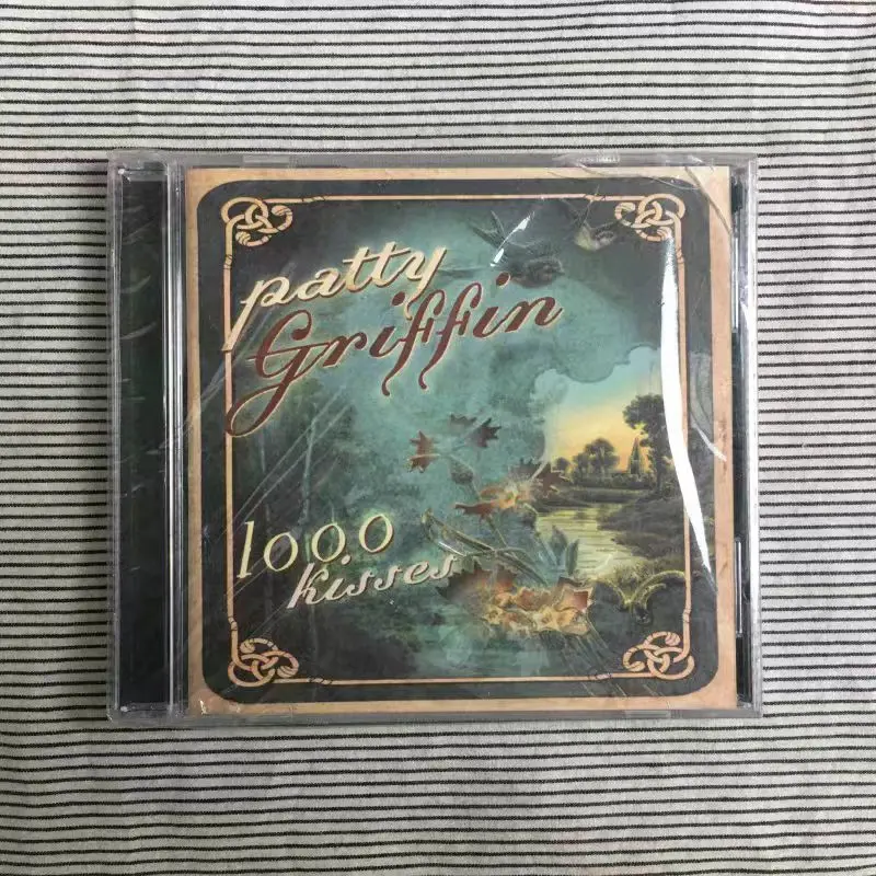 CD Patty Griffin, 1000 Kisses (2002), 9 de abril de 2002, el tercer álbum de estudio del aclamado cantante y compositor folclórico estadounidense