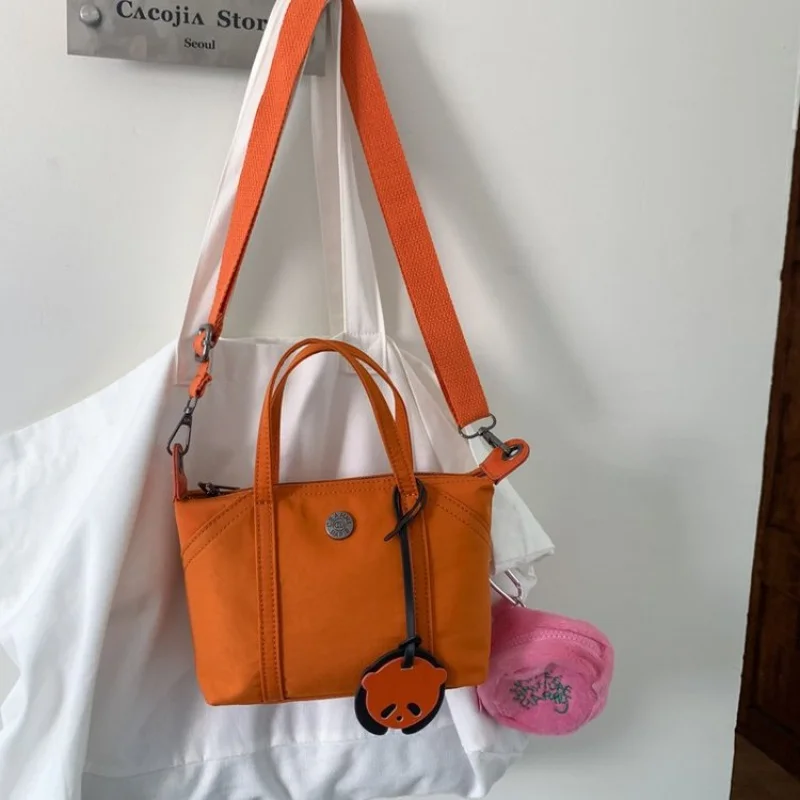 

Luxury Brand Inspired Women Handbag With Signature Pattern For Fashionable Outings And Events