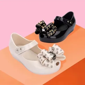 صندل صغير للبنات مع فيونكة لامعة مقاومة للماء أحذية شاطئية غير قابلة للانزلاق للأطفال HMI087 صيف 2024 أفضل 10 مبيعات صنادل ميليسا للأطفال - رقم 2