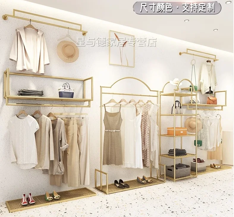 

Wall mounted luxury display shelf in clothing store Gold side hung wall mounted clothes shelf in women's clothing store