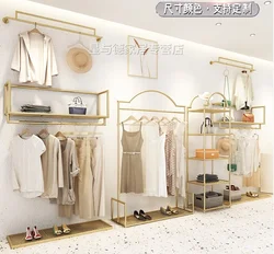 Wall mounted luxury display shelf in clothing store Gold side hung wall mounted clothes shelf in women's clothing store