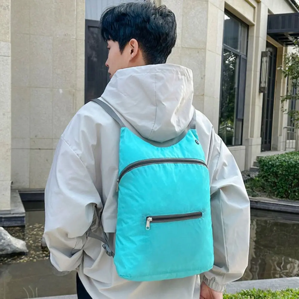 Mochila ultraligera plegable de gran capacidad para hombre, bolso de hombro ligero con cremallera de poliéster para deportes al aire libre