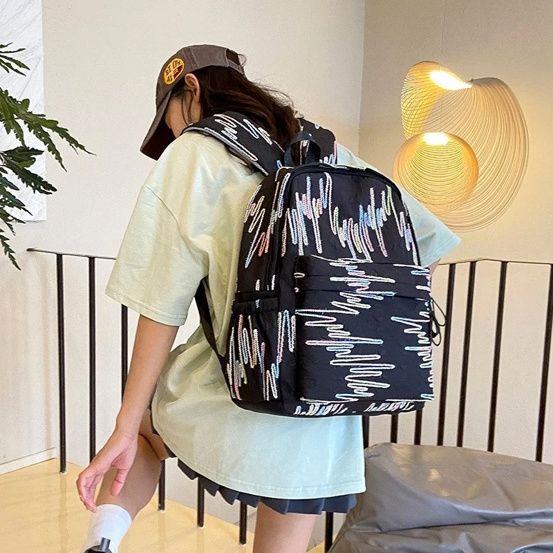 Large Capacity Backpack for Middle And High School Students Cartoon Graffiti Design Women's New Style Student Backpack