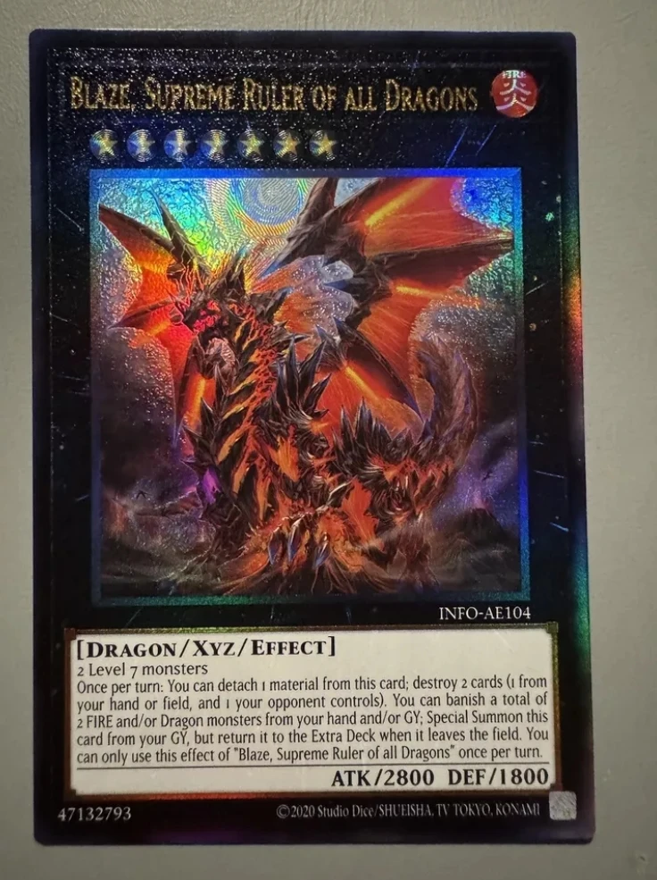 

Yugioh KONAMI Duel Monsters INFO-AE104 Blaze, Supreme Ruler of all Dragons Ultimate Rare Asian English Collection Mint Card