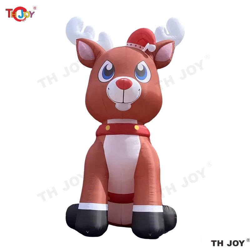 

2026 новый дизайн, милый гигантский надувной рождественский олень, сидящий на земле, большая мультяшная модель оленя лося для украшения фестиваля