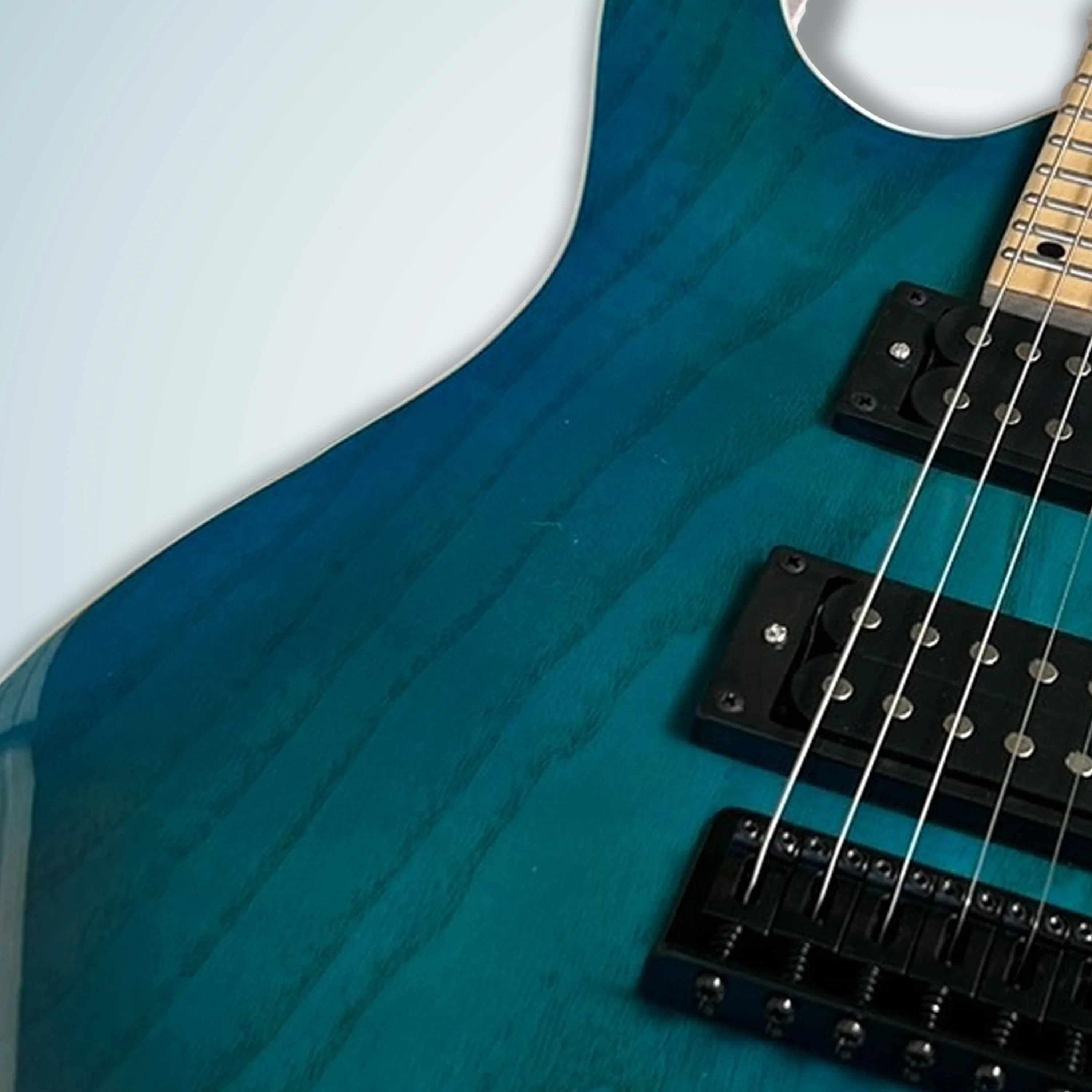 

New electric guitar 6 strings transparent blue ash veneer mahogany body maple neck and fingerboard black fixed bridge