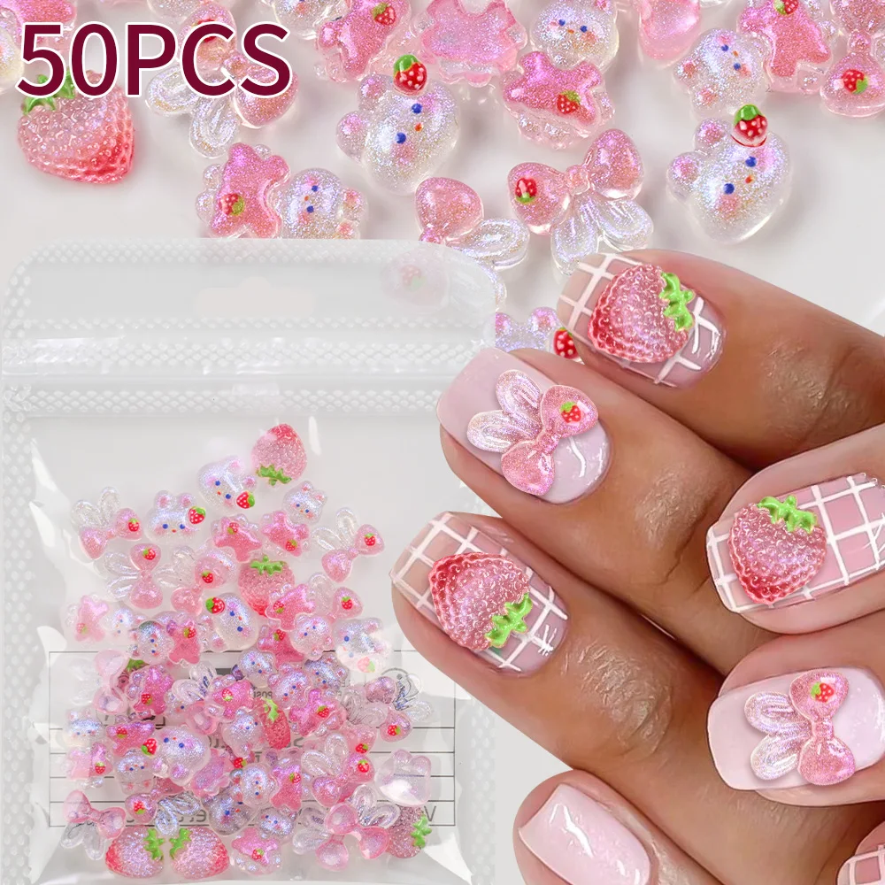 50個/袋 カワイイ シャイニー ピンク オーロラ 漫画風 いちご うさぎ ネイルアート チャーム 3D ミックス キュート リボン ネイルデコレーション マニキュア用品