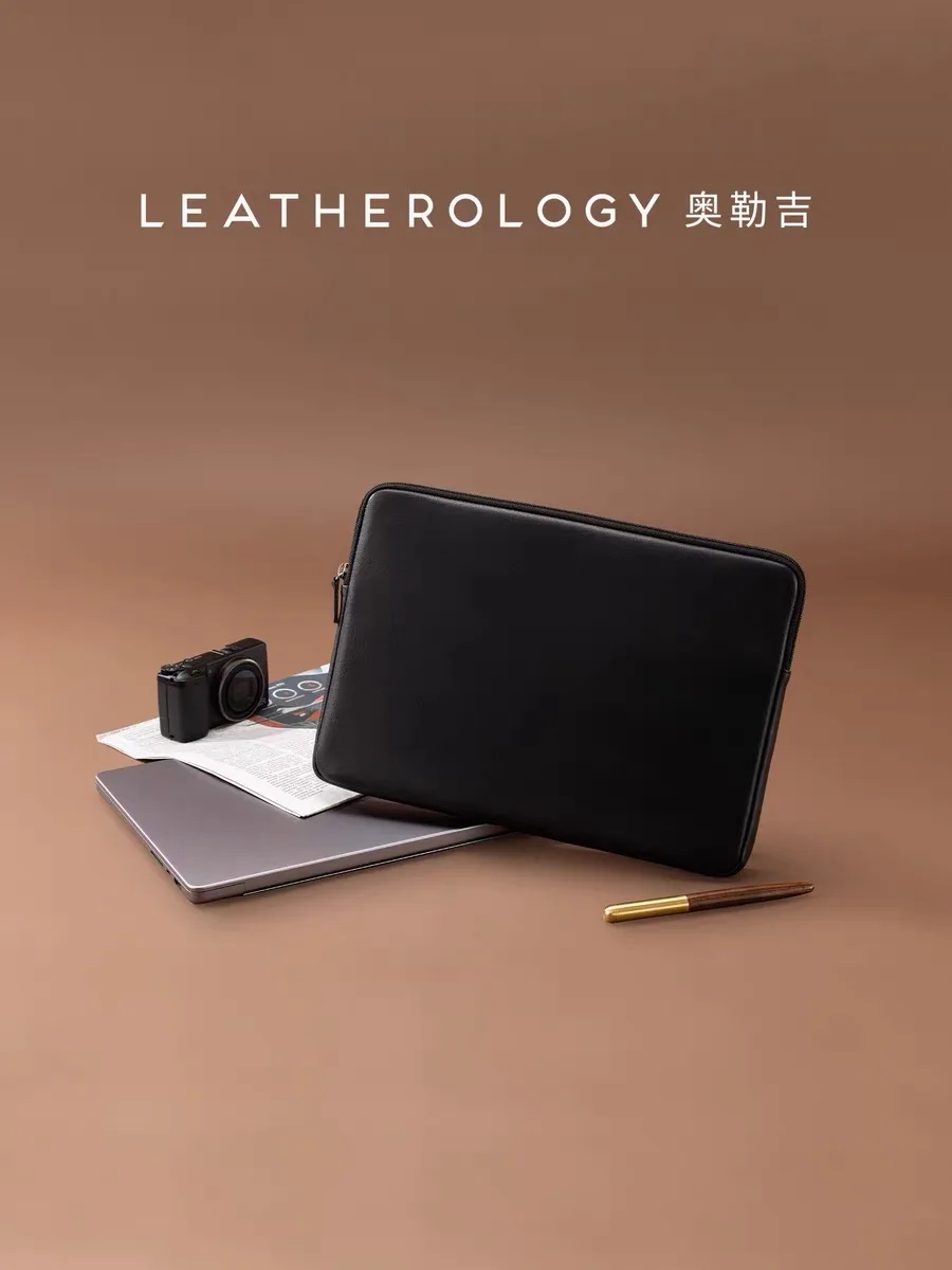 Leather computer bag suitable for MacBook, made of top-grain cowhide material.