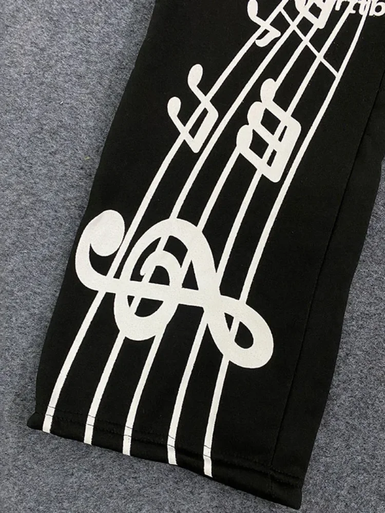 

Мужские черные широкие брюки, хлопковые брюки в стиле хип-хоп с музыкальным граффити, белый текстовый принт, повседневная уличная одежда, универсальная для работы