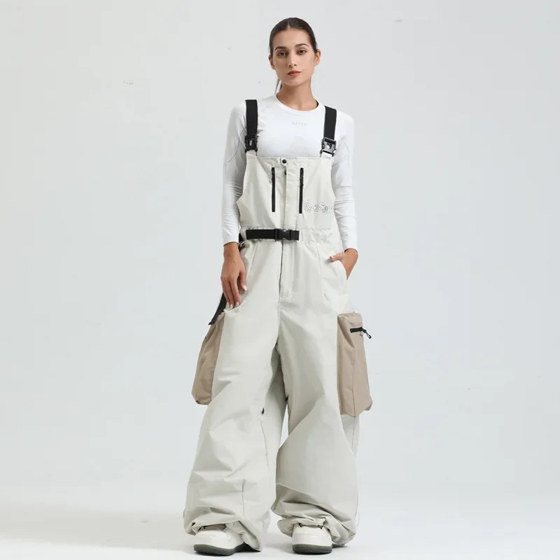 Gsou Snow nuevos pantalones de esquí para mujer, Snowboard de invierno a prueba de viento, impermeable, Bolsillo grande, monos de esquí de pierna ancha, pantalones de Snowboard para hombre y mujer