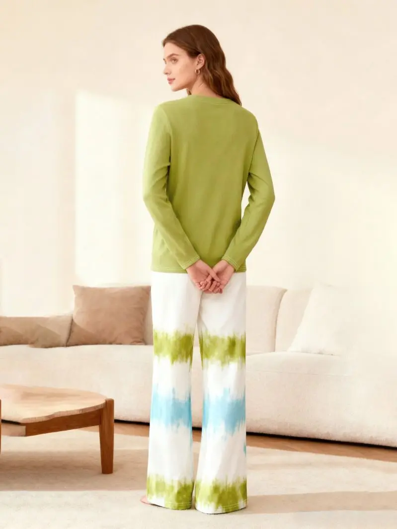 Round neck long sleeved loose top paired with straight leg pants for women's comfort two-piece set